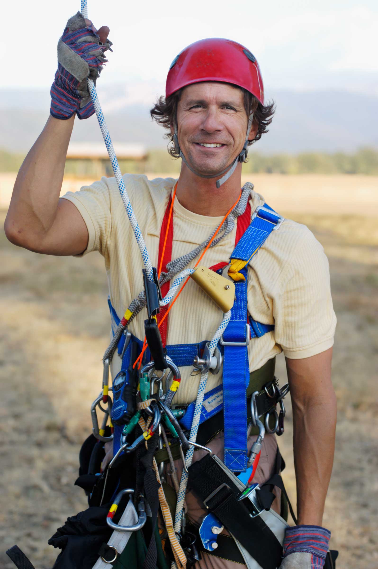 James Balog prepares to climb rope into national champion Valley Oak, Covelo, California, USA (2001)